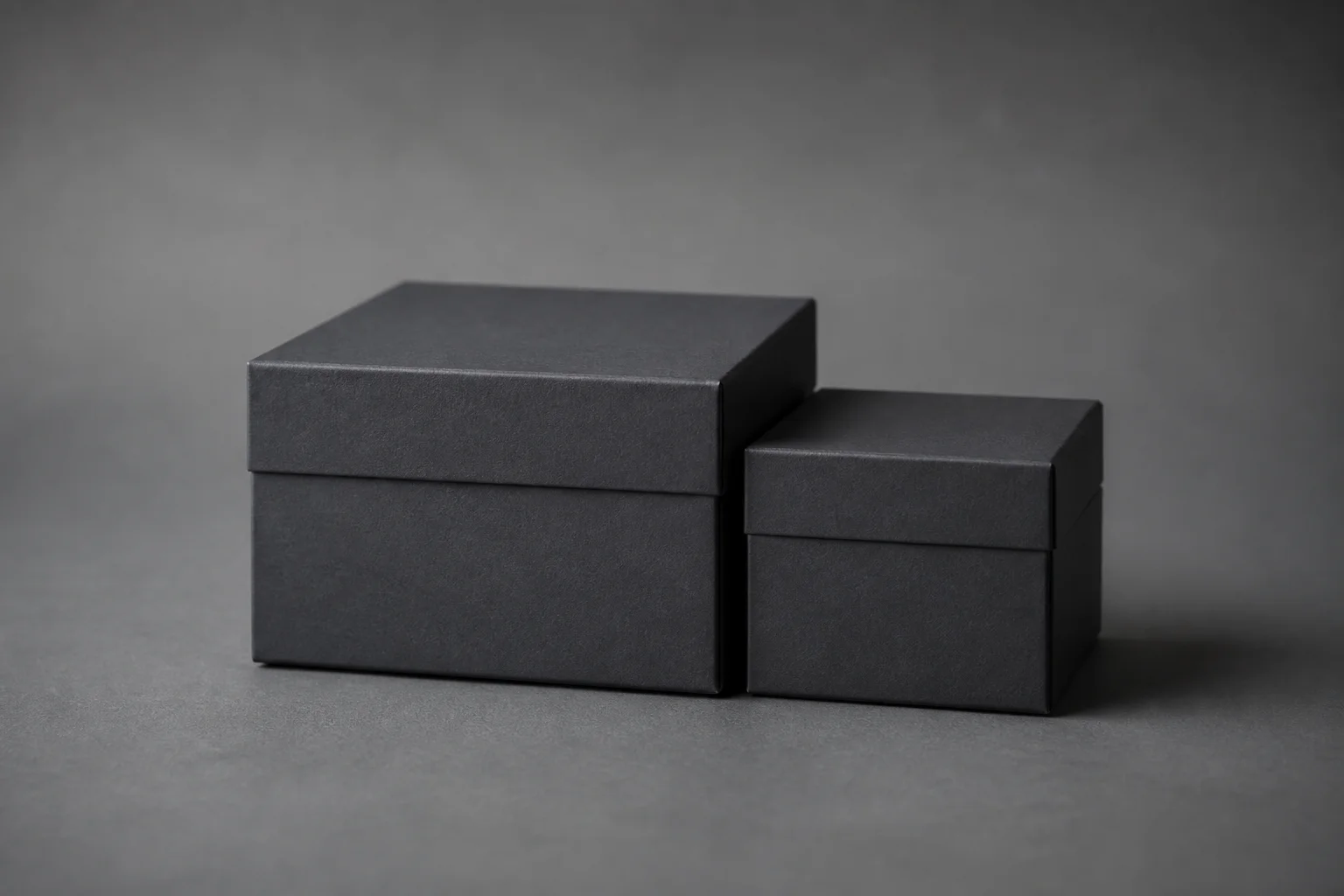 Zinc editorial still life of a main closed box beside a smaller sidecar box